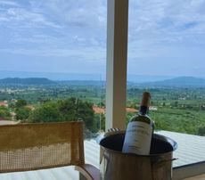 Crispy calamari and lemon wedges on a seaside table